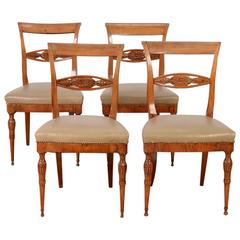Set of Four Italian Neoclassical Carved Side Chairs