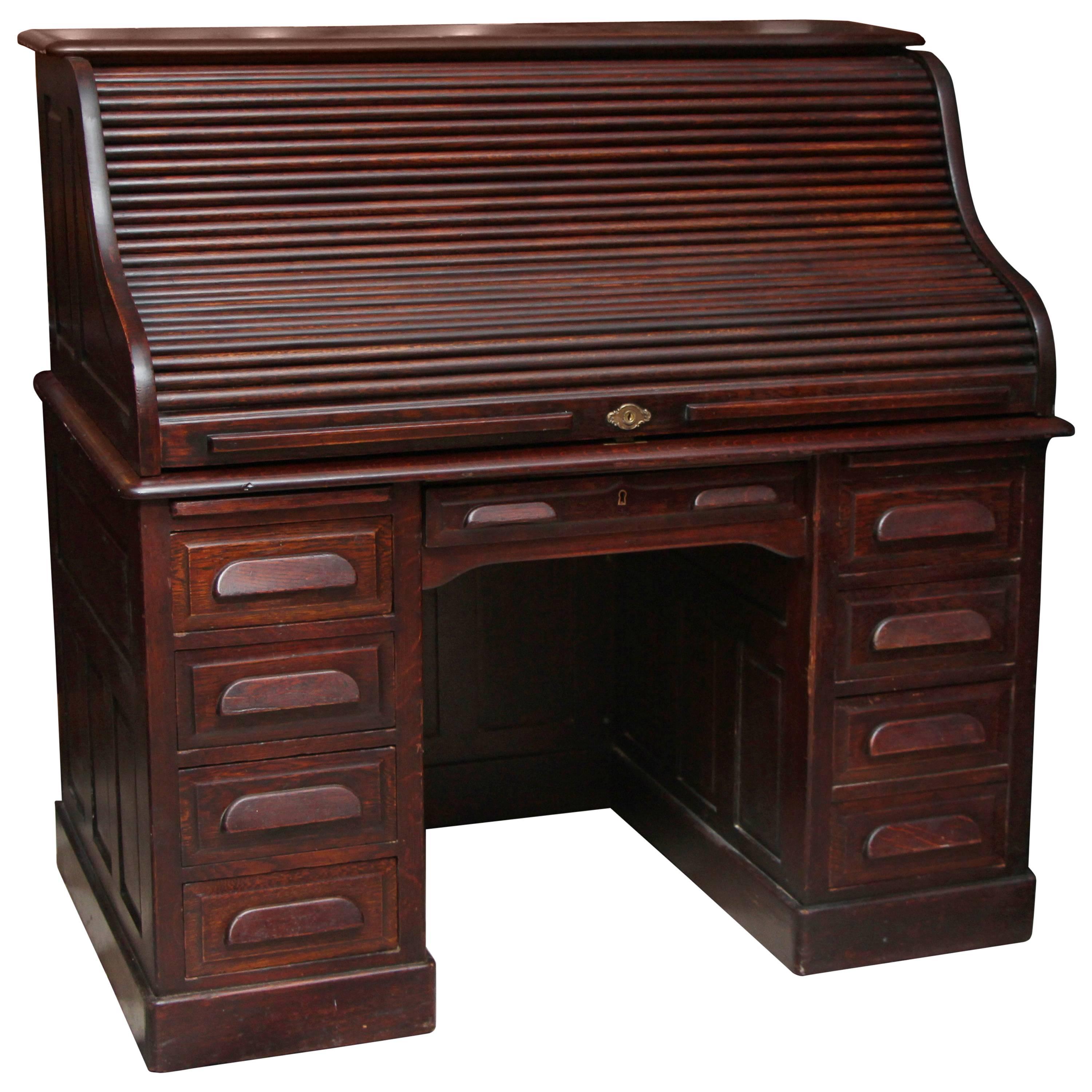 1910s Petite Antique Wooden Serpentine Roll Top Desk with Nine Drawers