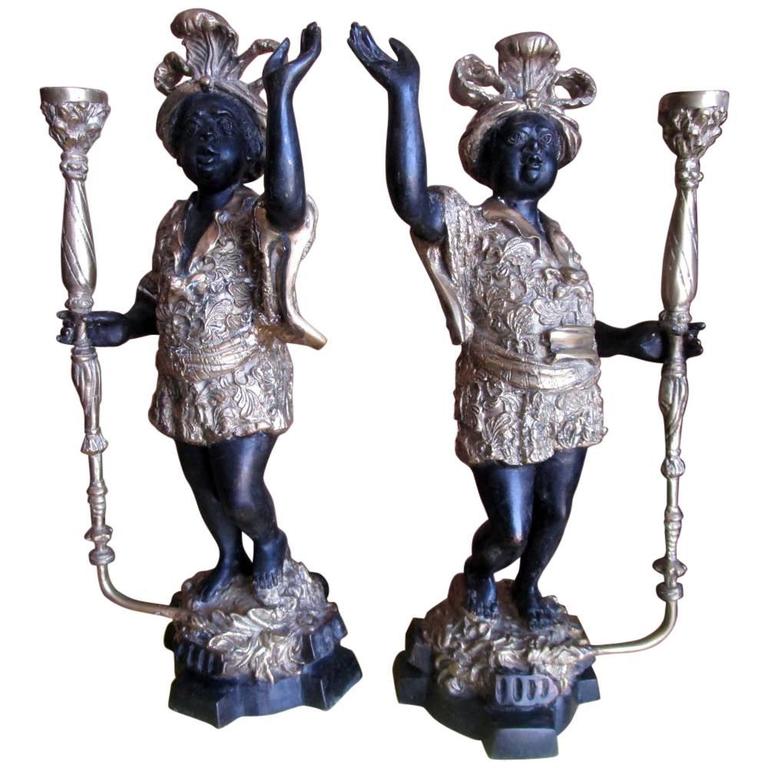 Vintage Blackamoor cast bronze pair of candle holders For Sale at 1stdibs