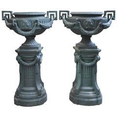  Pair of Garden Vases, made out of cast iron. Period 1940