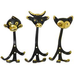 Three Walter Bosse Brass Wall Hooks of a Monkey, Cow and Cat, Austria, 1950s