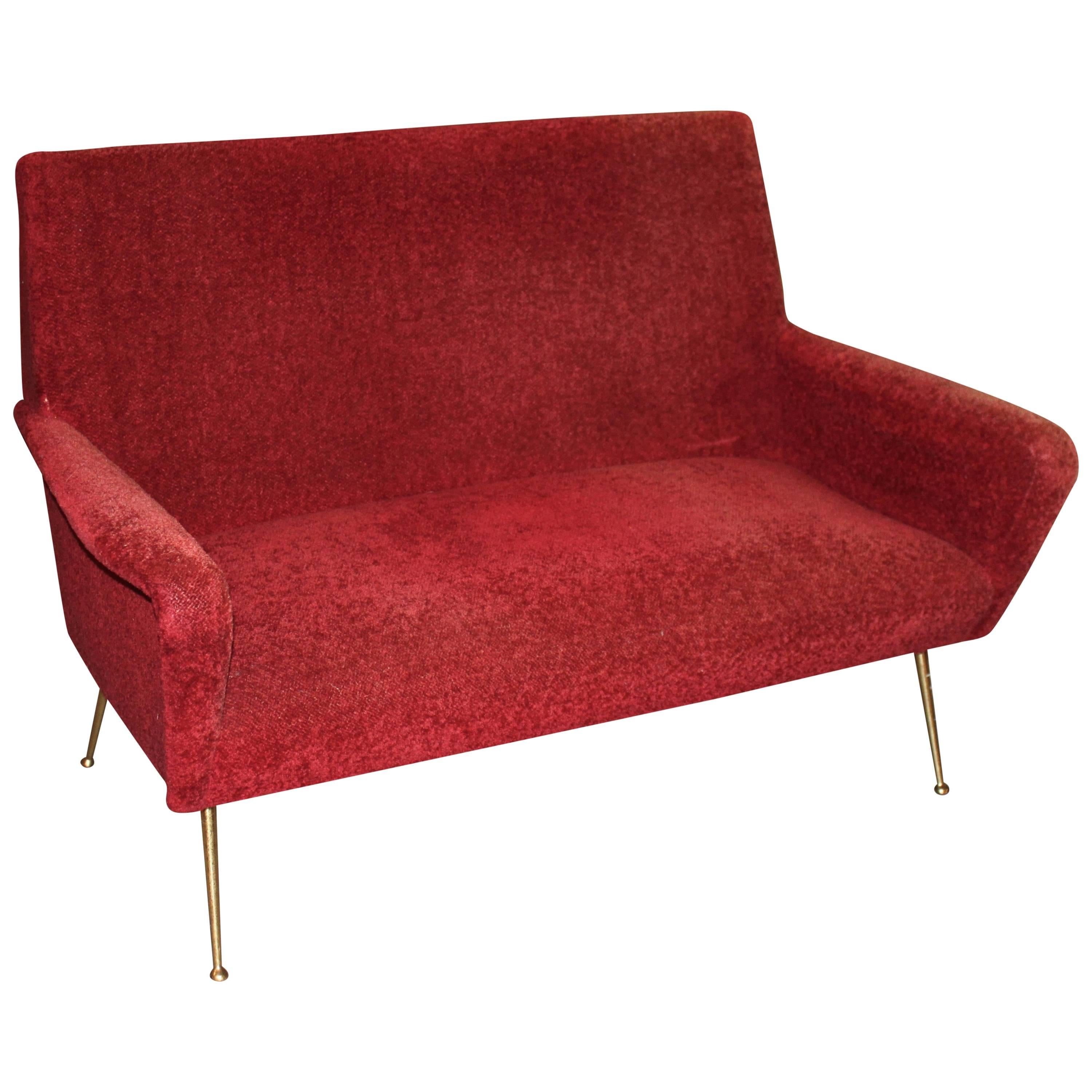 Beautiful Italian Mid-Century Modern settee sofa with brass legs. Ready for your choice of upholstery.
 