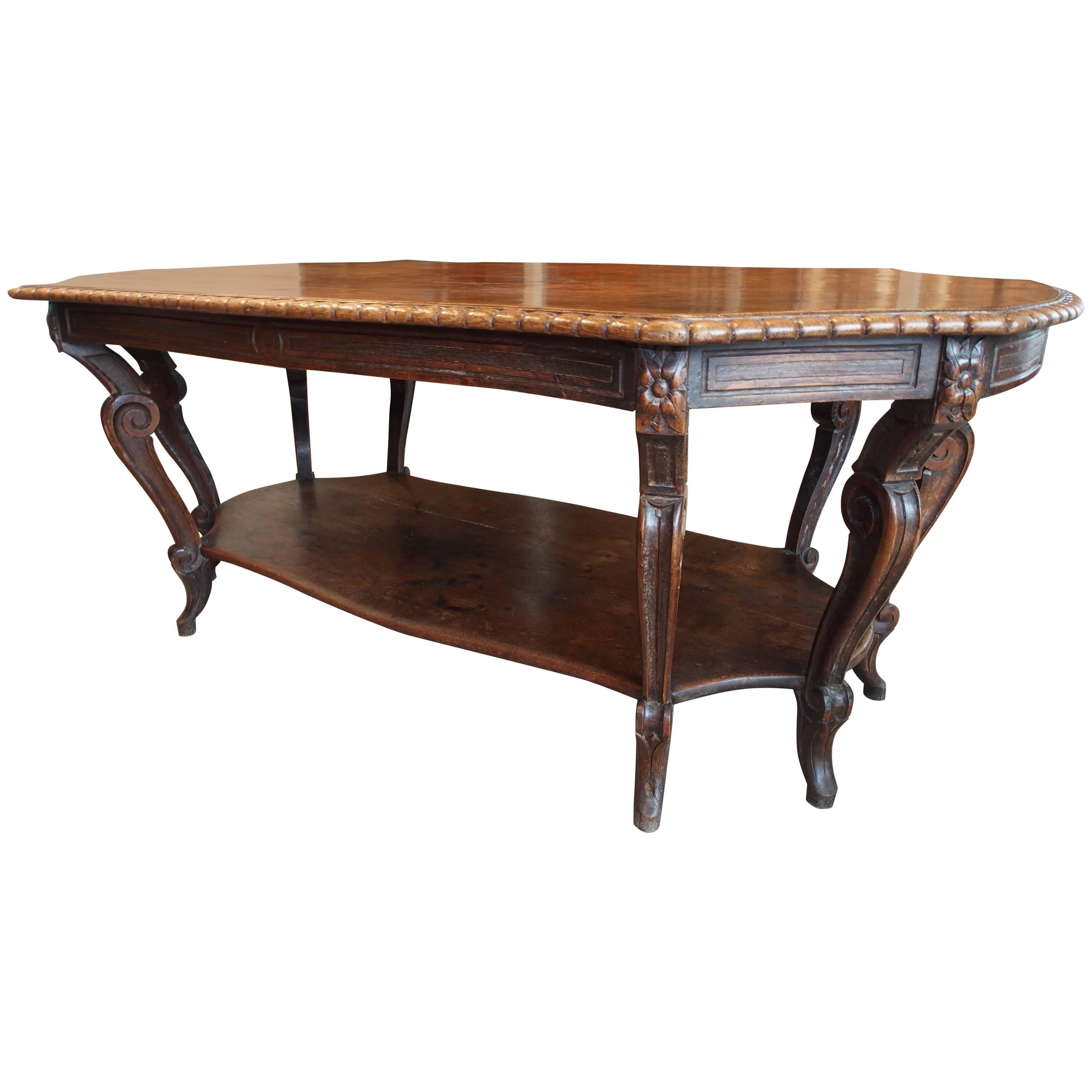 Italian Walnut Carved Table, 19th Century, with 8 Curved Legs and Low Shelf For Sale