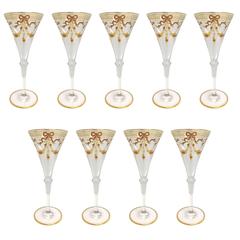 Nine Rare Moser Glass Campagne Flutes Richly Gilded in Two Tones, circa 1900