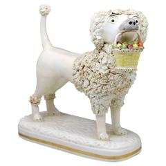Large Staffordshire Figure of a Poodle with Basket in Mouth, circa 1840 