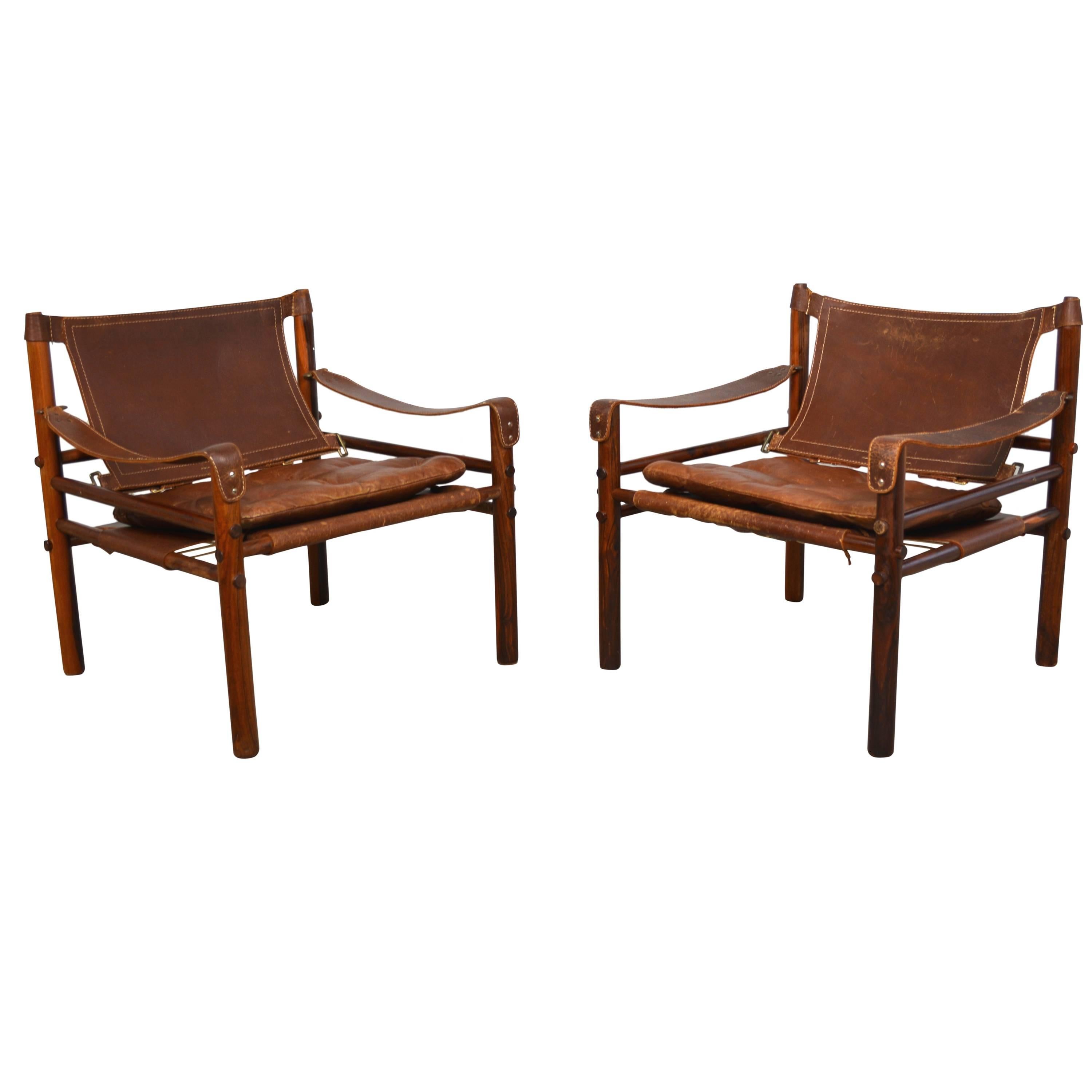 Pair of Arne Norell "Sirocco" Leather Safari Chairs