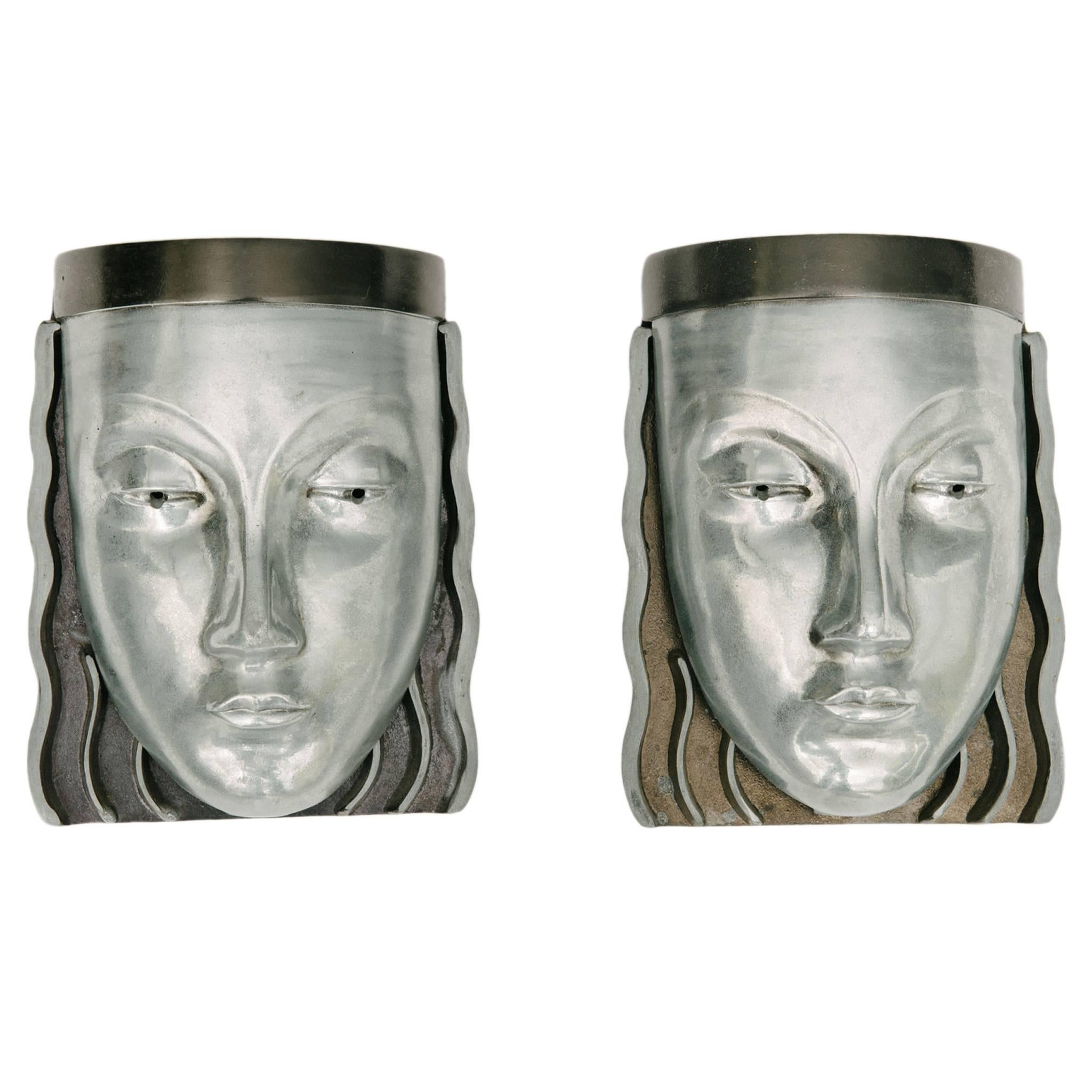 Pair of Art Deco Style Aluminum Face Sconces