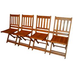 Chairs in Joined Set of Four that Fold Up