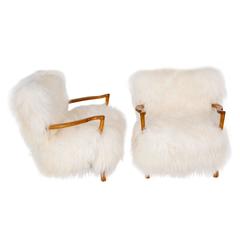 Fritz Schlegel (attributed) Pair of Easy Chairs in sheepskin and oak
