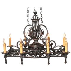 Antique 19th Century French Black Wrought Iron Eight-Light Chandelier