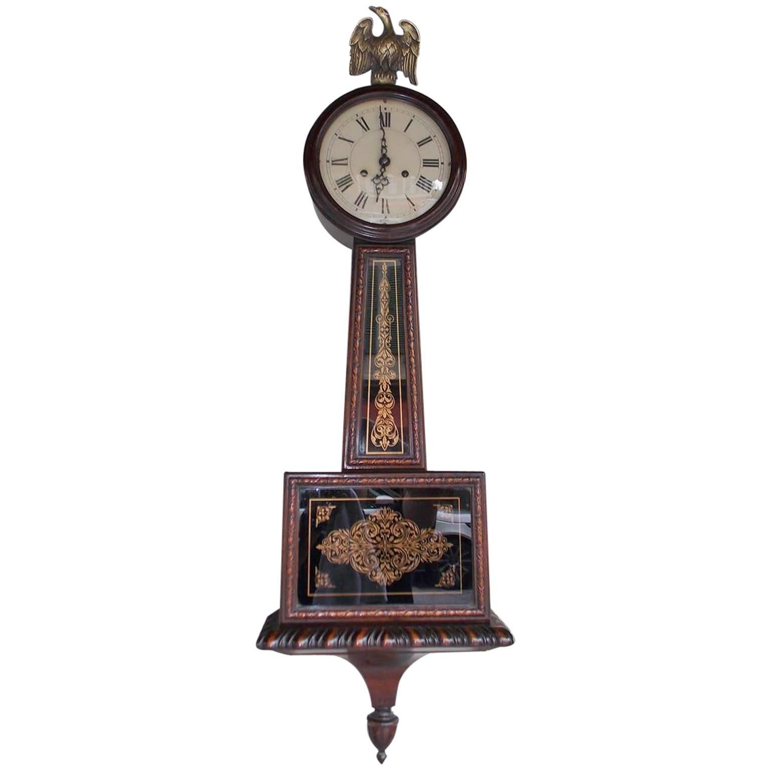 German Mahogany Eglomise Banjo Clock.  Circa 1880