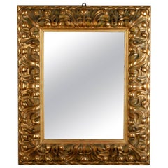 19th Century Italian Mirror with Deeply Carved Gilded Frame