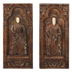  Pair of Striking Antique Carved Panels of Saints, Philippines, circa 1900s
