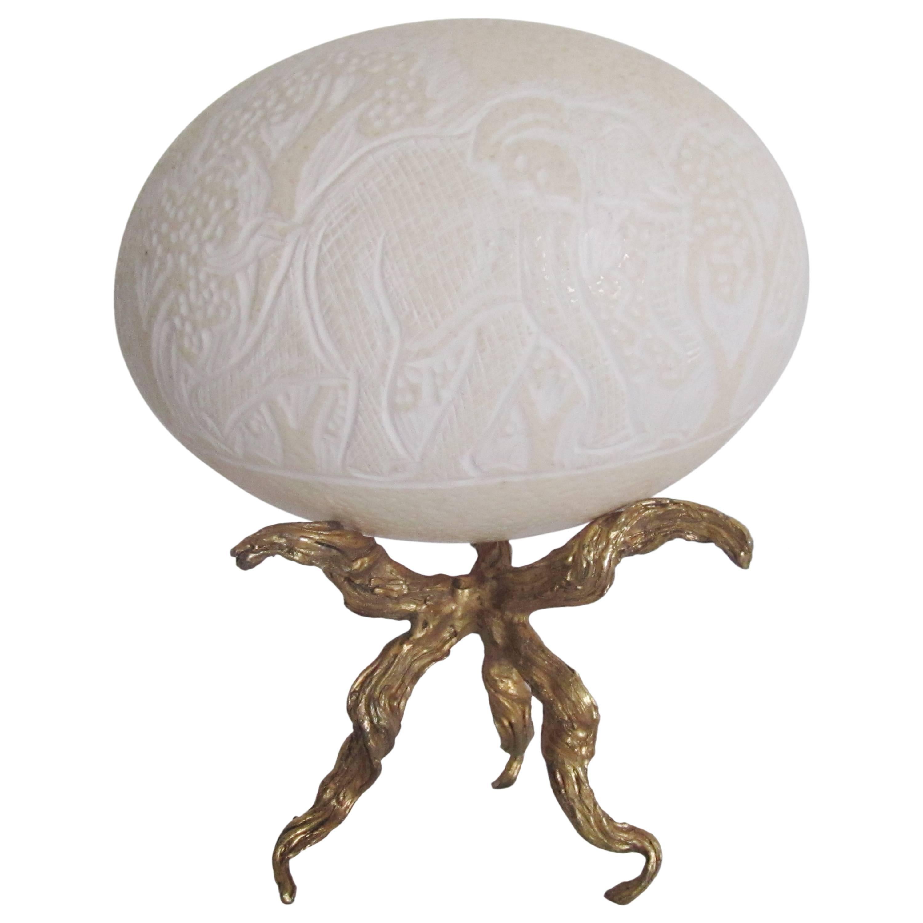 Elephant and Rhino Craved Ostrich Egg on Twisted Gold Base