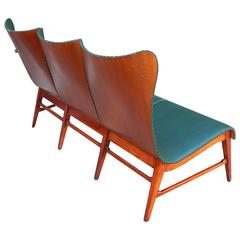 Swedish Mid-Century Modern Paneled Wingback Sofa by Axel Larsson, circa 1950