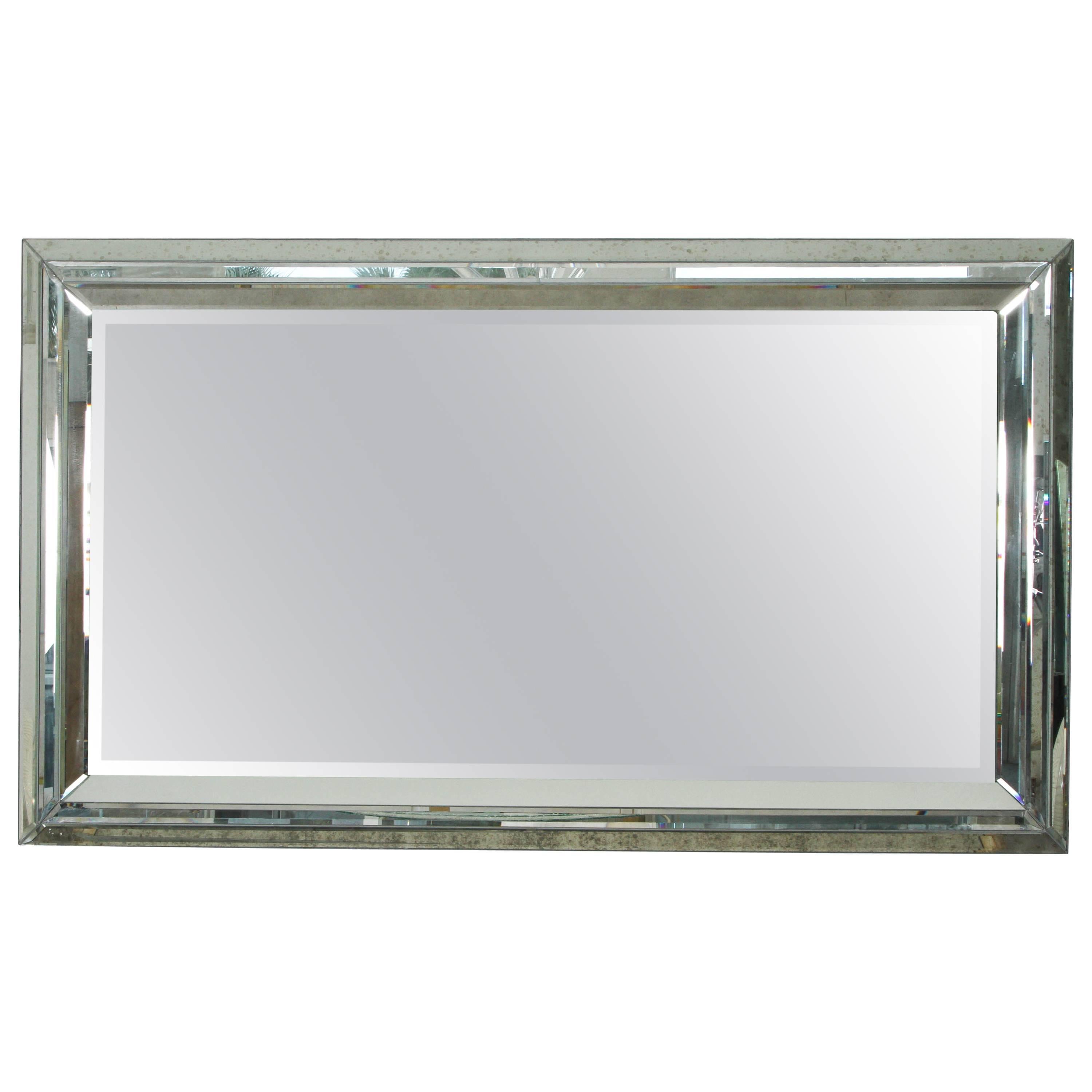 Grand Mirror with a Faceted Mirrored Frame
