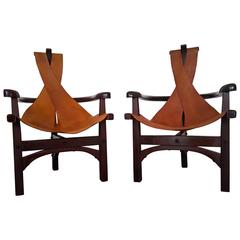 Pair of Three-Legged Arts and Crafts Slung Leather Lounge Chairs