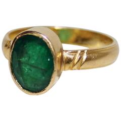 Three Carat Emerald and 18K Ladies Gold Ring