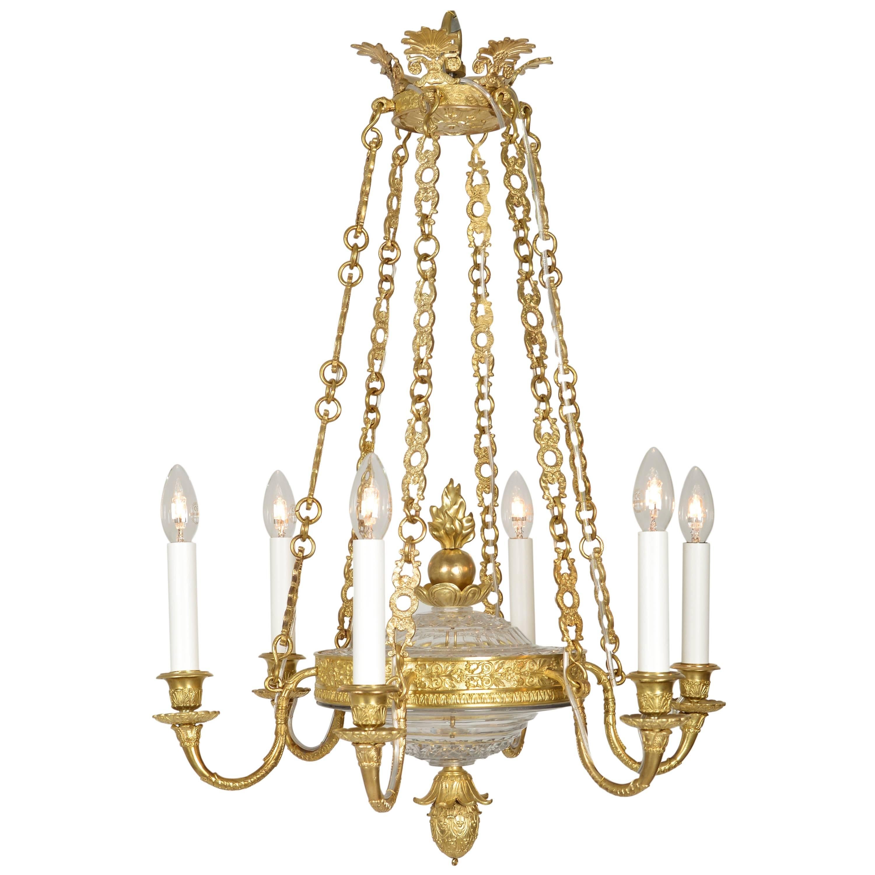 Empire Chandelier with cut glass and gilded cast brass frame For Sale