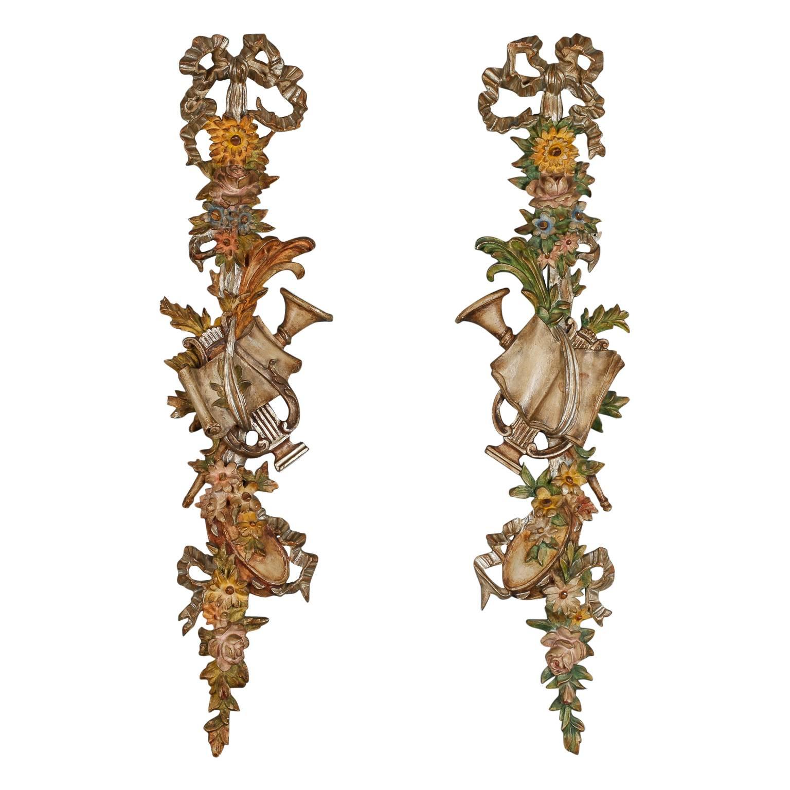 Pair of Tall Painted and Gilded Wall Carvings Depicting Spring and the Arts For Sale