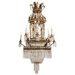 Antique Italian Neoclassical Pressed Brass, Iron and Glass Twelve-Light Chandelier