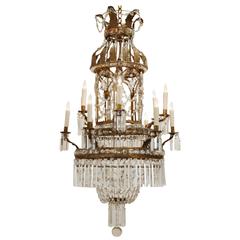 Italian Neoclassical Pressed Brass, Iron and Glass Twelve-Light Chandelier 1