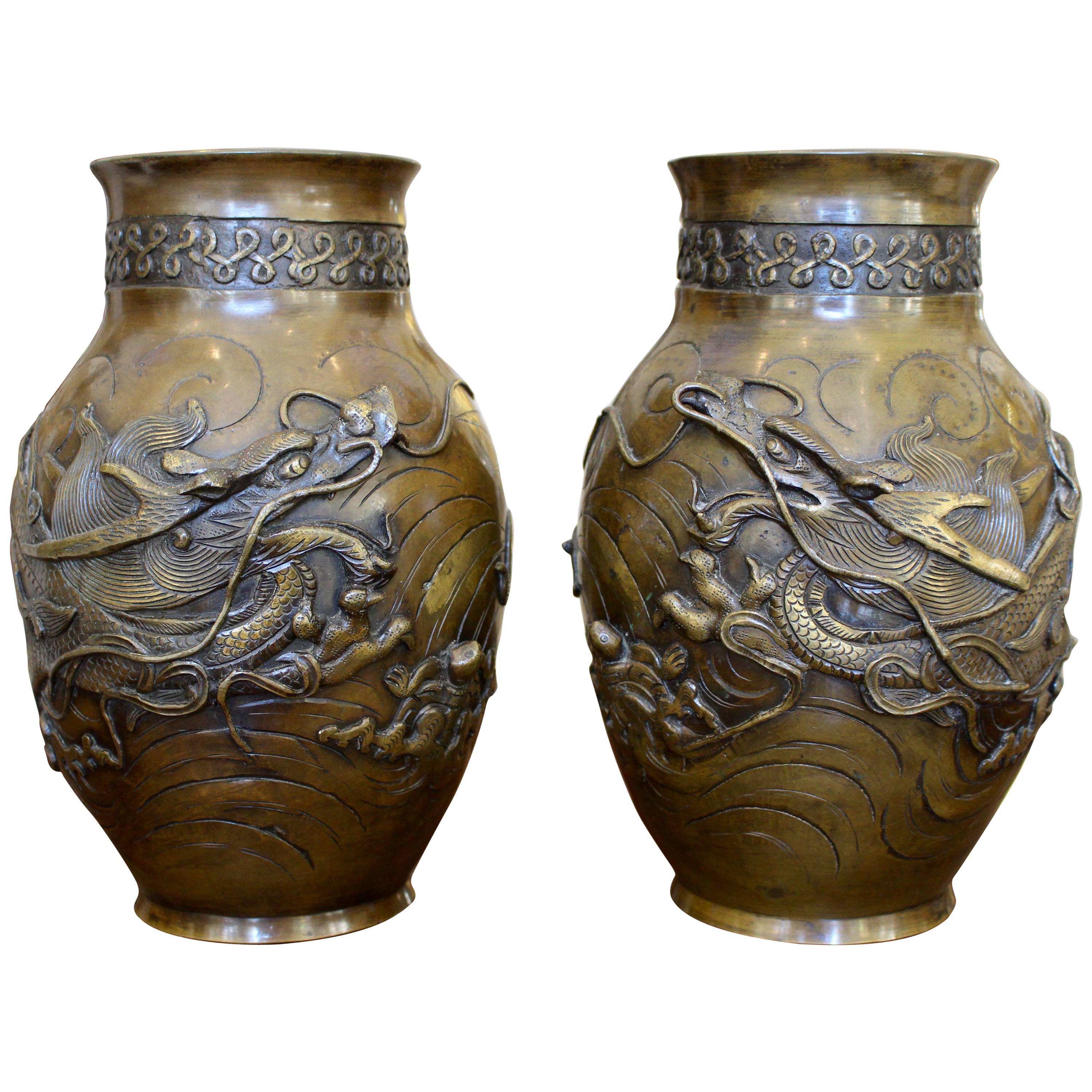 Pair of Japanese Bronze Vases Finely Cast with High Relief Dragon Figures For Sale