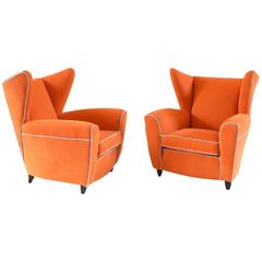 Pair of Large Attributed Melchiorre Bega Wingback Orange Armchairs, 1952
