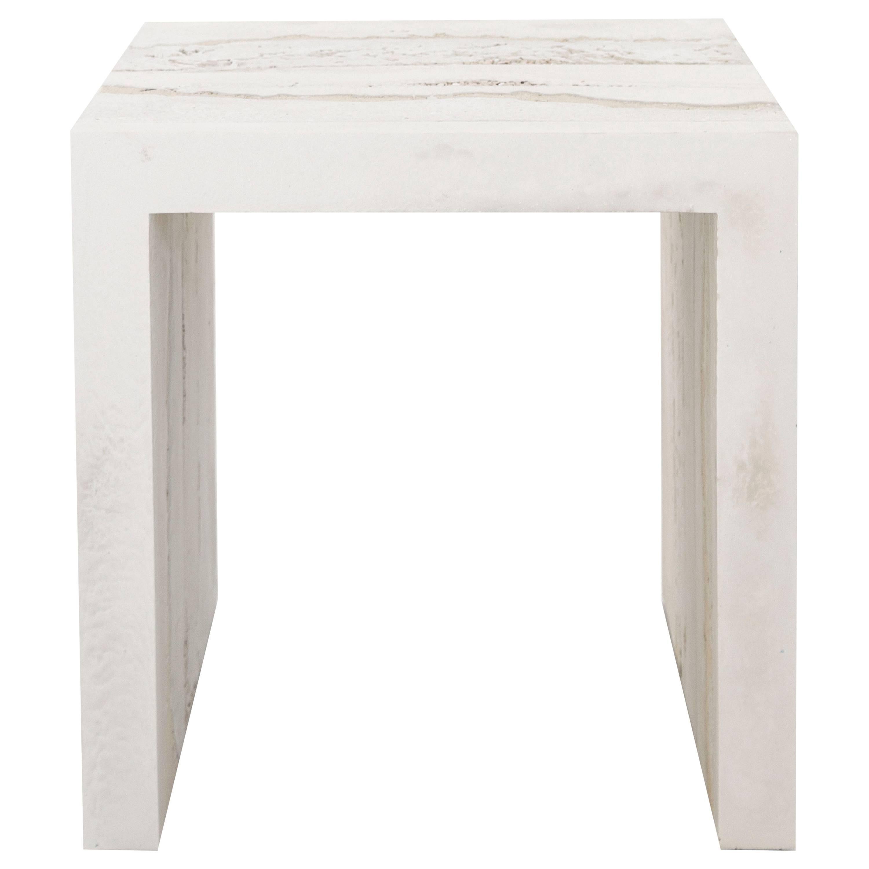 This side table consists of a hand-dyed cream cement, crushed porcelain, and tan sand. The aggregates are packed within the cement cast in an organic nature. Custom options available, please inquire with the studio.