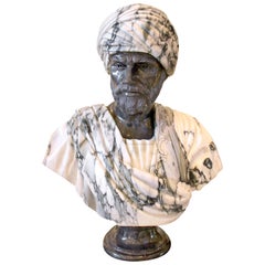 Carved Grey and Black Marble Draped Bust from the 20th Century