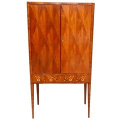 Swedish Storage Cabinet In Walnut with Inlaid Musical Instruments, Circa 1940