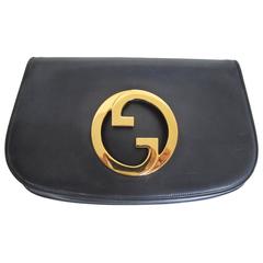Vintage Chic 1970s Gucci Clutch Bag with Brass Double G