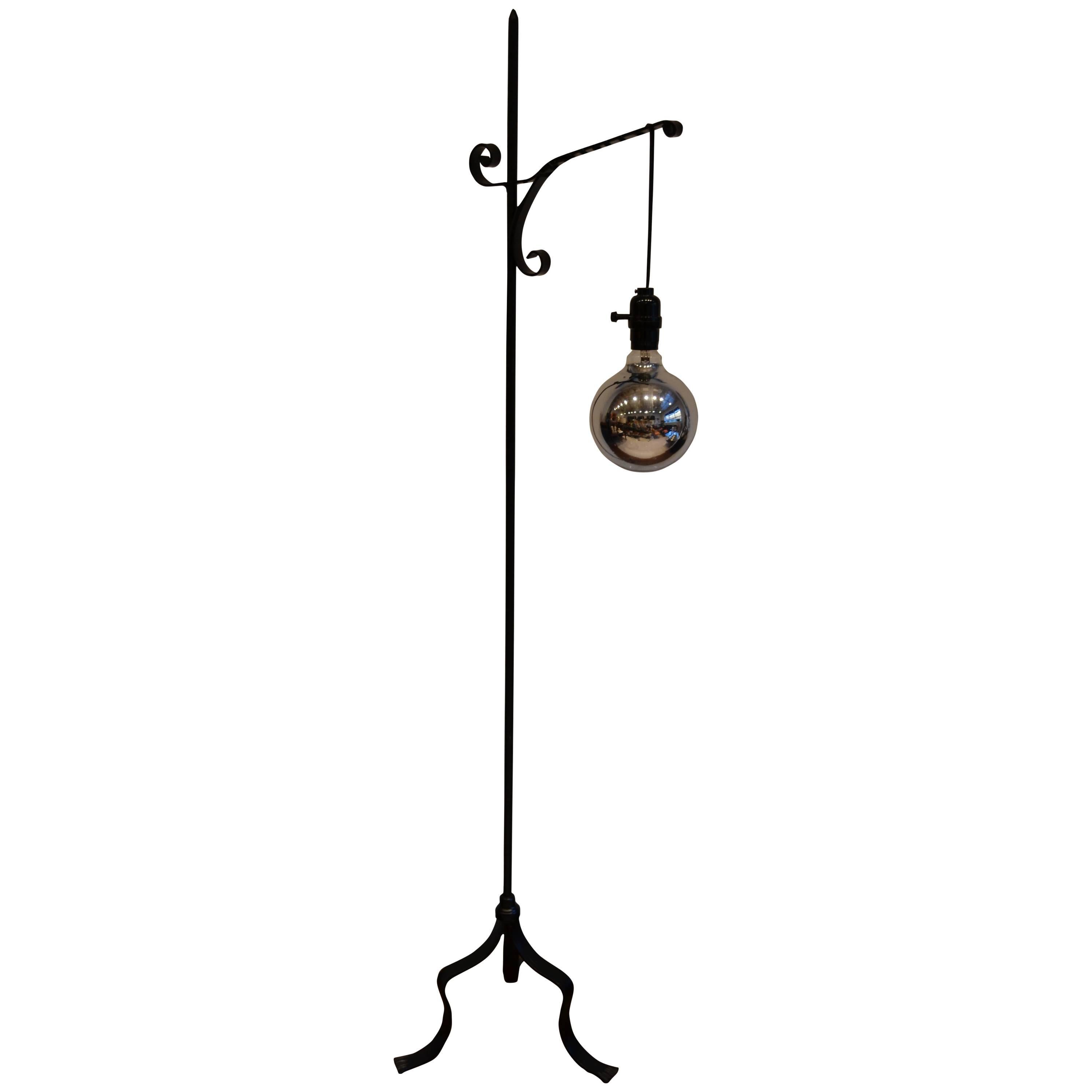 Machine Age Industrial Black Wrought Iron Floor Lamp with Mercury Silver Bulb For Sale