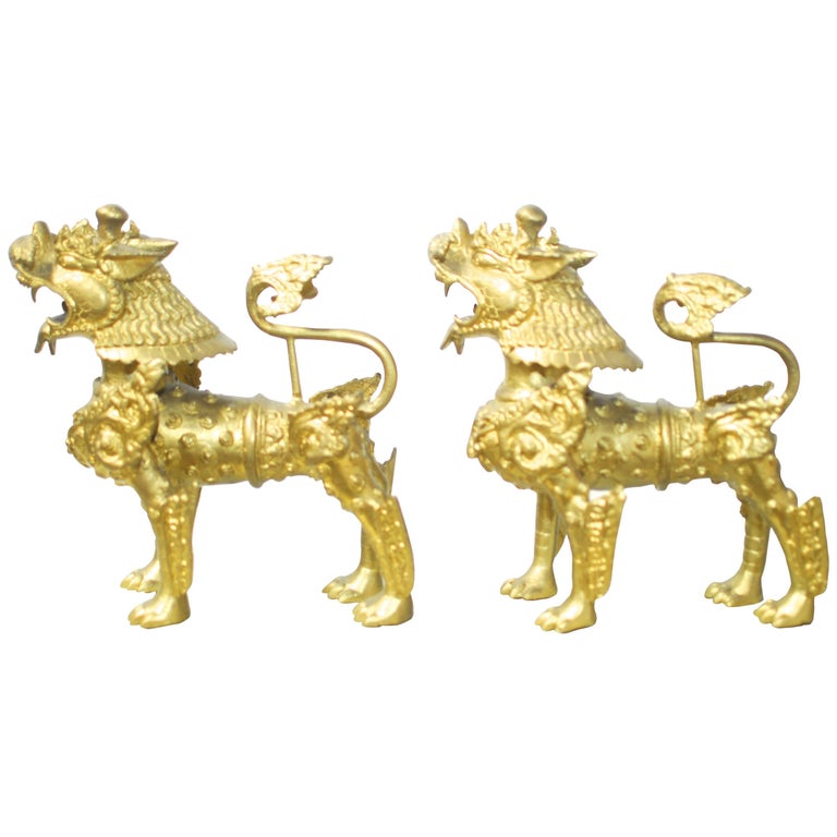 Pair of Southeast Asian Brass Foo Dogs with Gilt Finish at 1stDibs