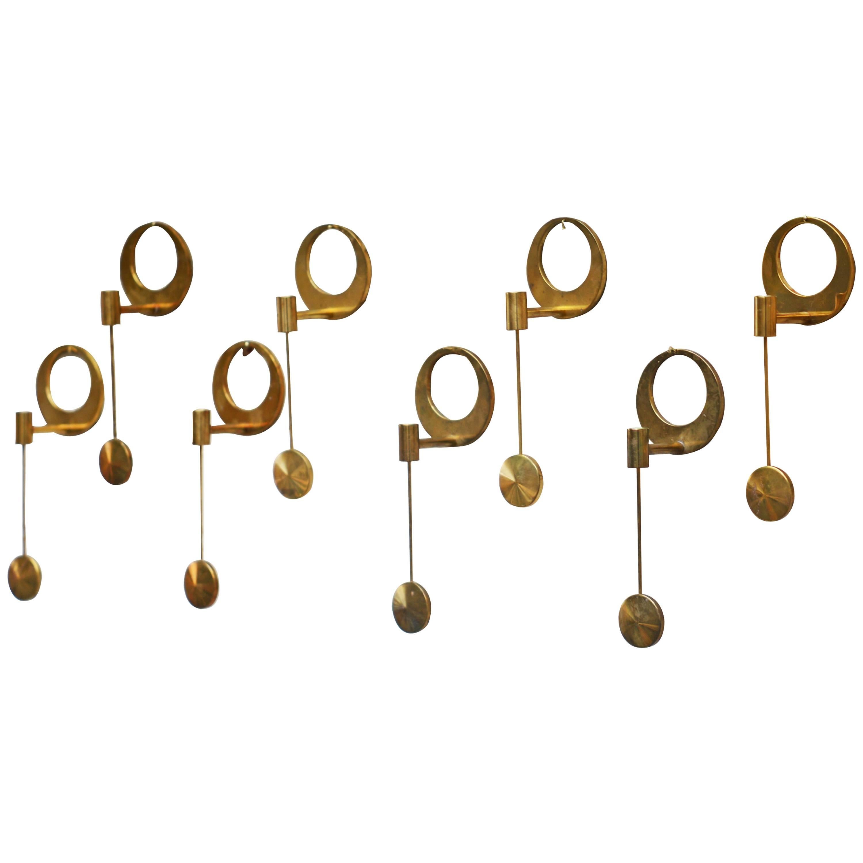 Arthur Pe Eight Round Brass Wall Candlesticks Made by Hand by the Artist, Sweden For Sale
