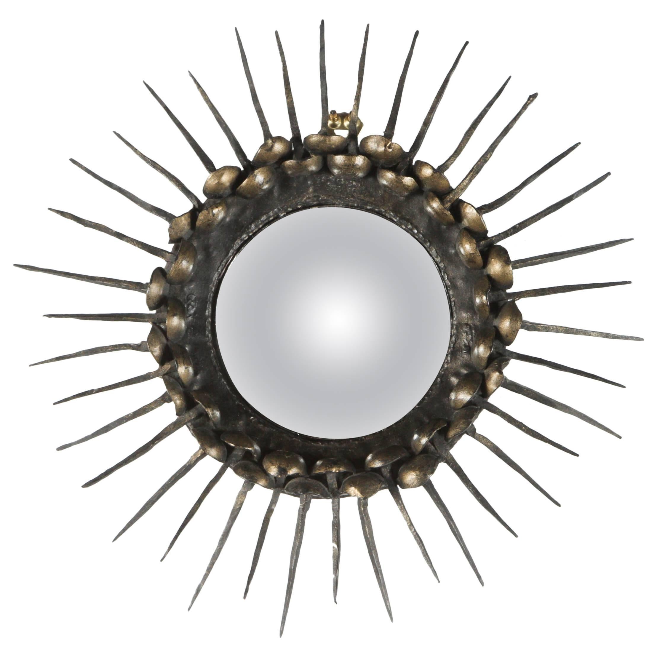 Convex Sunburst Mirror with a Frame of Spikes with Brass Nailheads For Sale