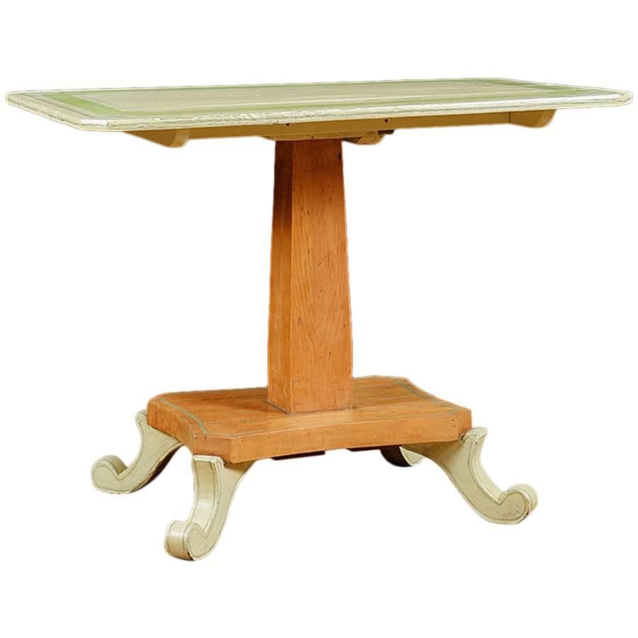 European pine tilt-top table that has been painted, circa 1835.
Painting is newer then table.
Measures: 37 1/2
