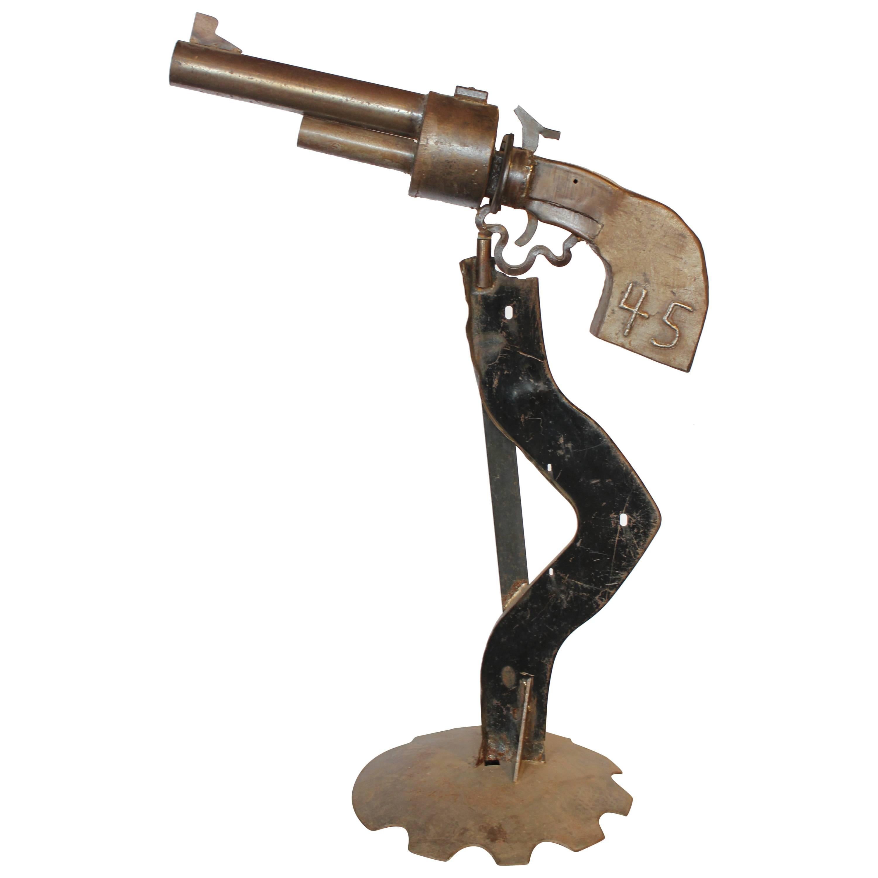 Large Mid-Century Metal Revolver 45 Sculpture For Sale