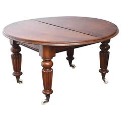19th Century Victorian English Large Mahogany Dining Table with Three Leafs