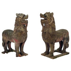 45" Pair of Wood Palace Lions S.E. Asia Weathered with Mica Eyes, circa 1850