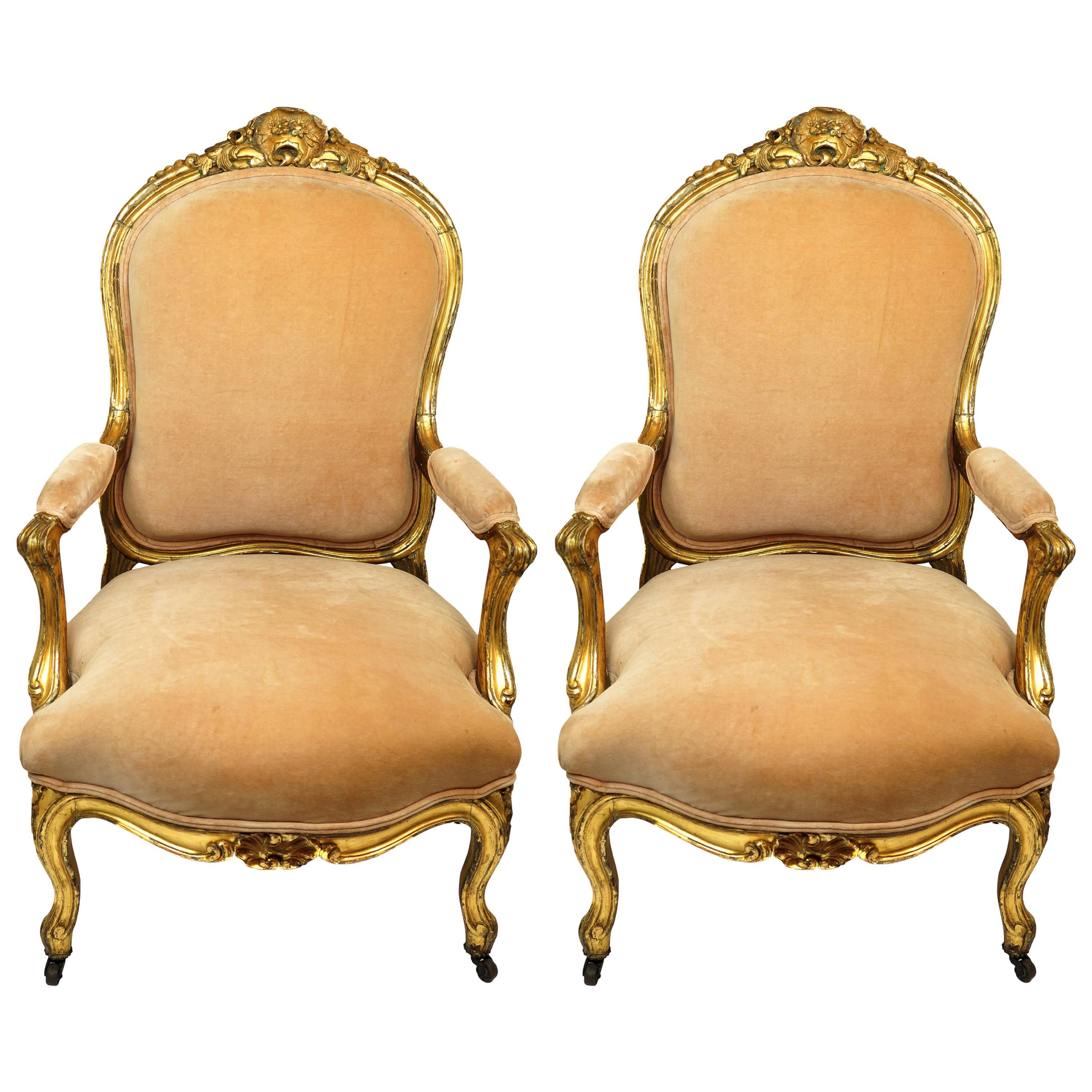 Pair of Louis XV Style Carved Giltwood Amchairs