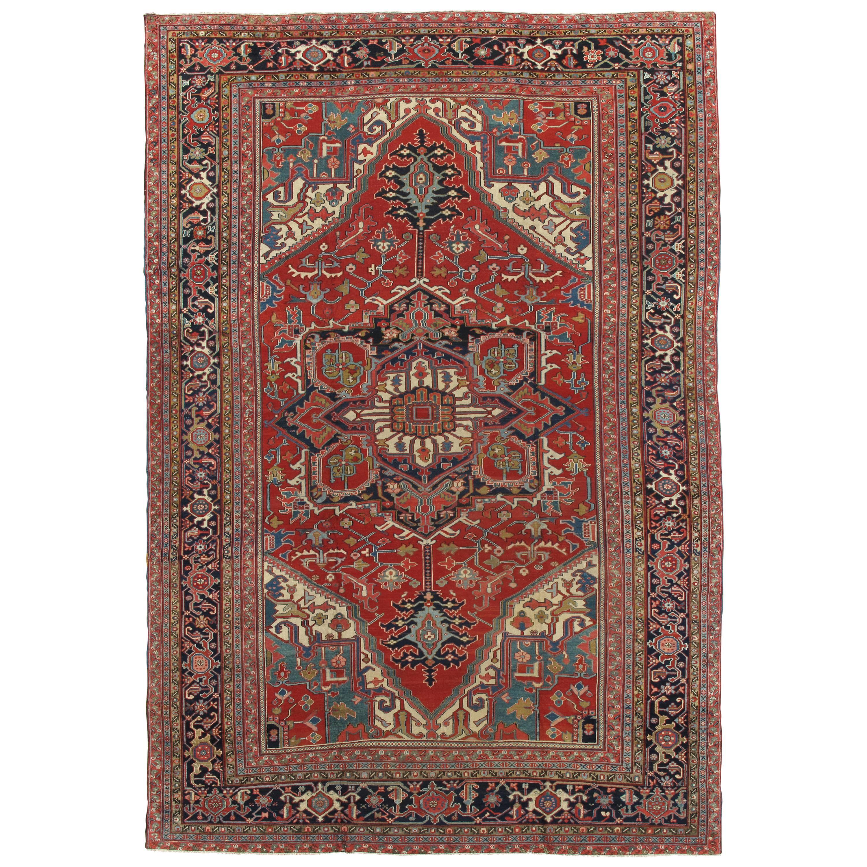 Antiker persischer Heriz-Teppich, handgefertigter orientalischer Teppich aus Wolle, rot und marineblau und hellblau im Angebot
