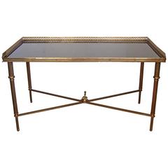 French Louis XVI Style Brass and Black Glass Cocktail Table