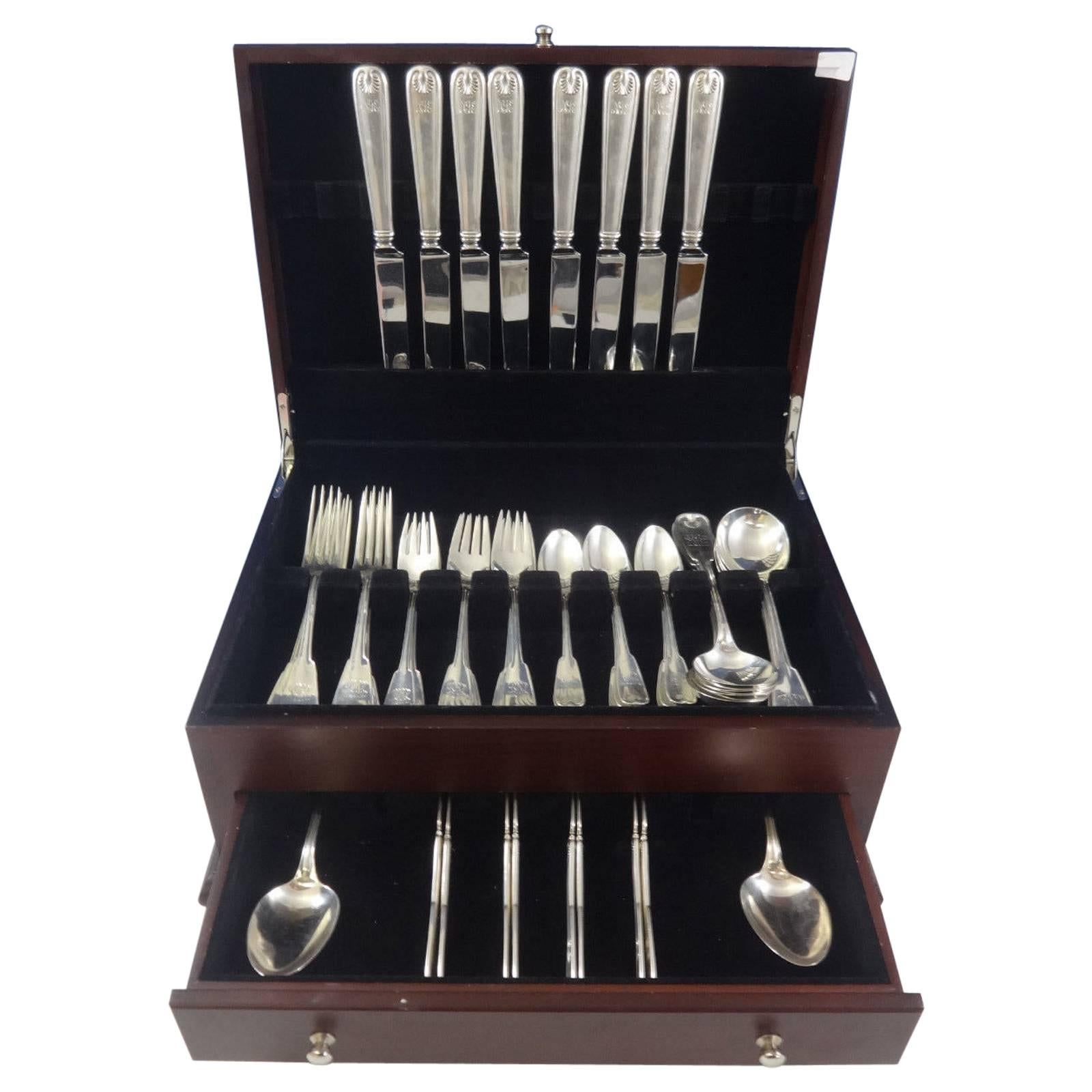 Exceptional Palm by Tiffany & Co. sterling silver flatware set of 50 pieces. This pattern was designed by Edward C. Moore and introduced in the year 1871. This set includes:

 
Eight dinner size knives, 10 1/8