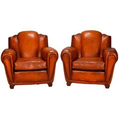 Pair of French Saddle Tan Leather Club Chairs With Triple Channel Back
