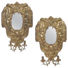 Antique Pair of Continental Polished Brass Repoussé Two Light Sconces