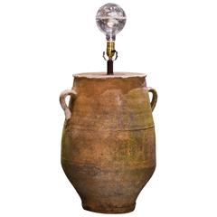Antiker griechischer Olivenkrug als Lampe