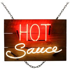 Hot Sauce Neon Sign on Wood