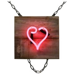 Pink Neon Heart with Curl on Salvaged Wood