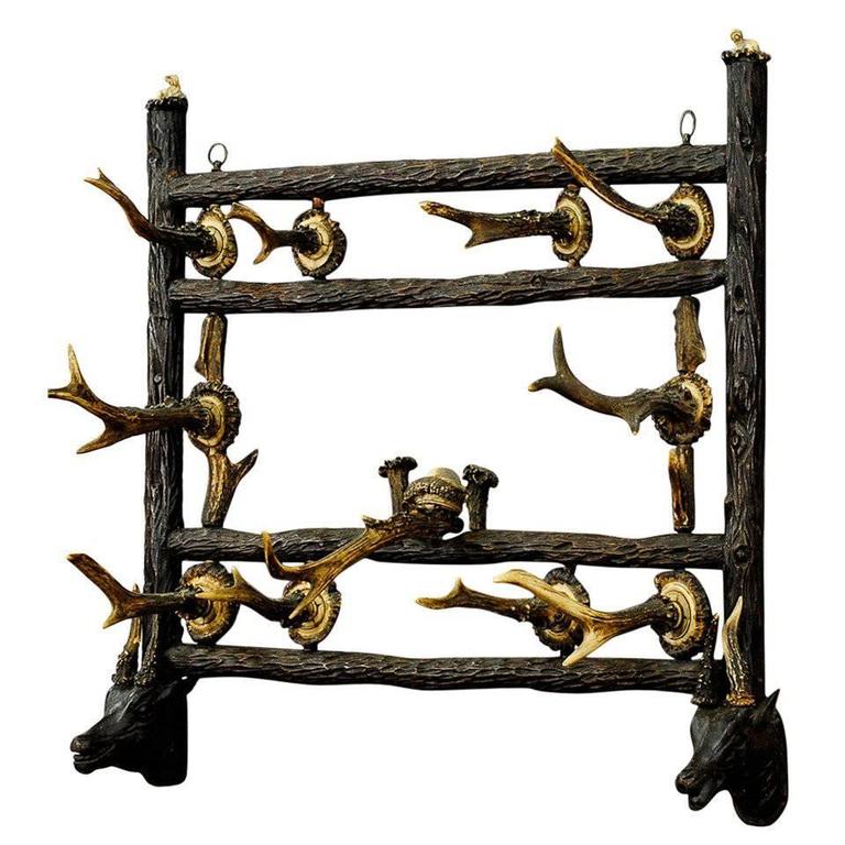 Black Forest Wooden Carved Coat Rack with Antler Carvings, circa 1900